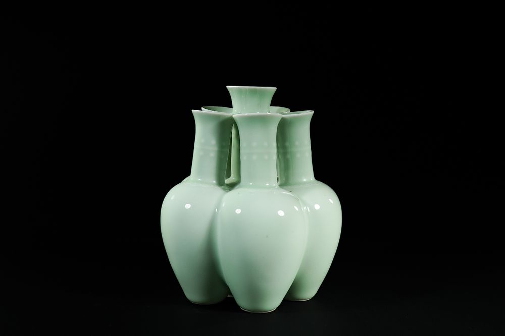 Lot 331: A Chinese Celadon-Glazed Six-Neck Vase, Qianlong Mark.