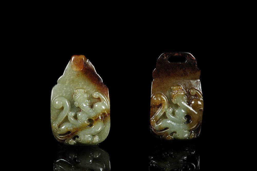 Lot 332: A Pair of Chinese Jade Belt Ornaments.