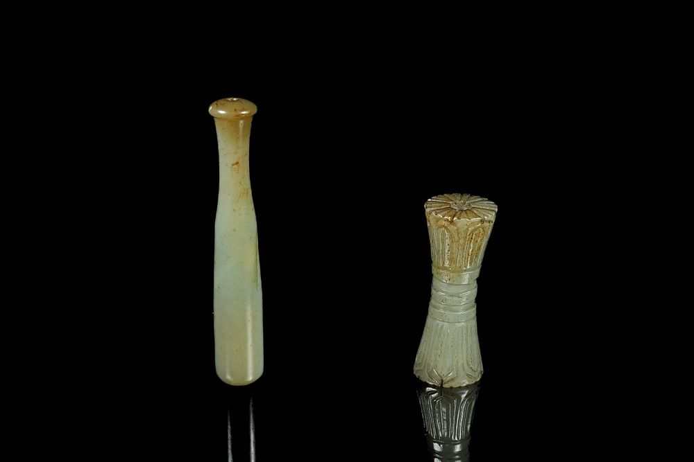 Lot 334: A Pair of Chinese Celadon Jade Carved Ornaments.