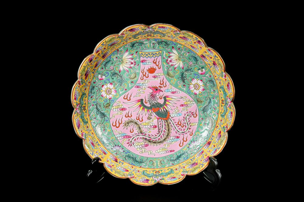 Lot 341: A Chinese Famille Rose Scalloped Charger with Phoenix...