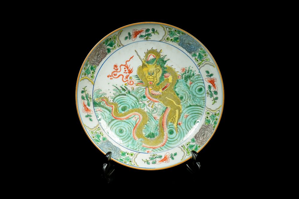 Lot 352: A Chinese Famille Verte ‘Striding Dragon’ Dish, Guangxu...