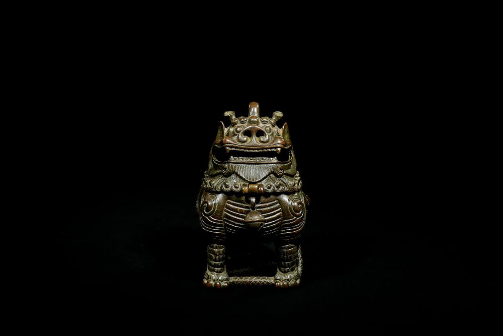 Lot 353: A Chinese Bronze Mythical Beast Censer.