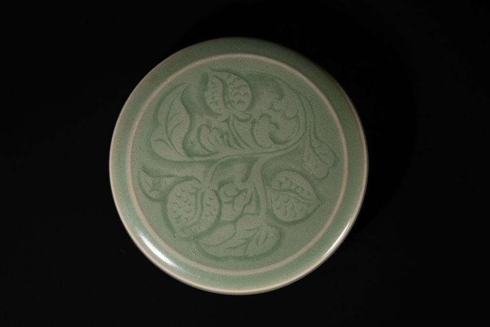 Lot 367: A Chinese Longquan Celadon Circular Lidded Box.