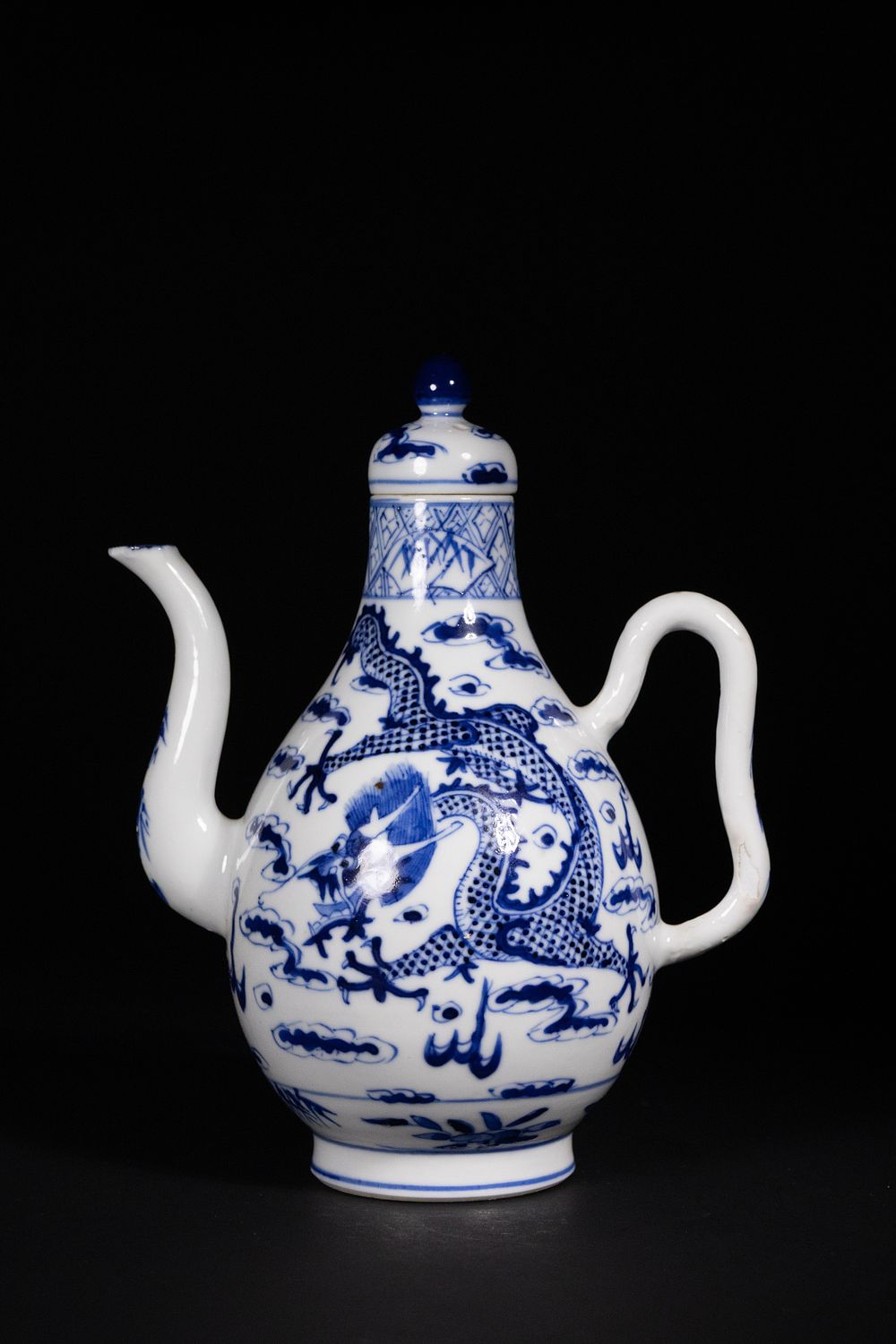 Lot 391: A Chinese Blue and White Dragon Ewer with...