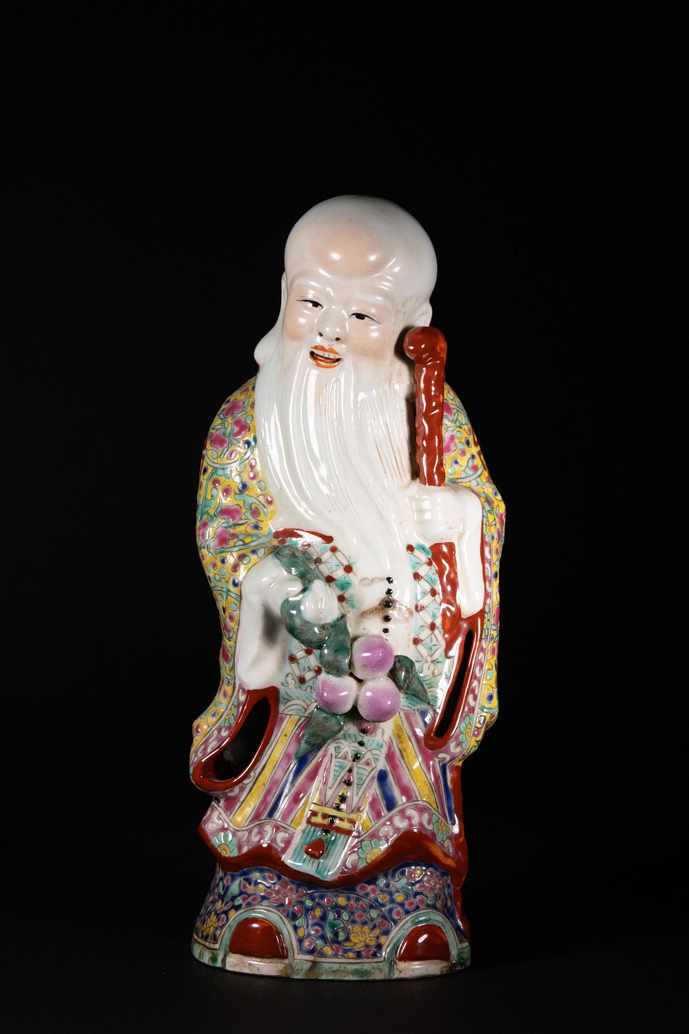Lot 402: A Chinese Polychrome Porcelain Figure of Shou Lao.