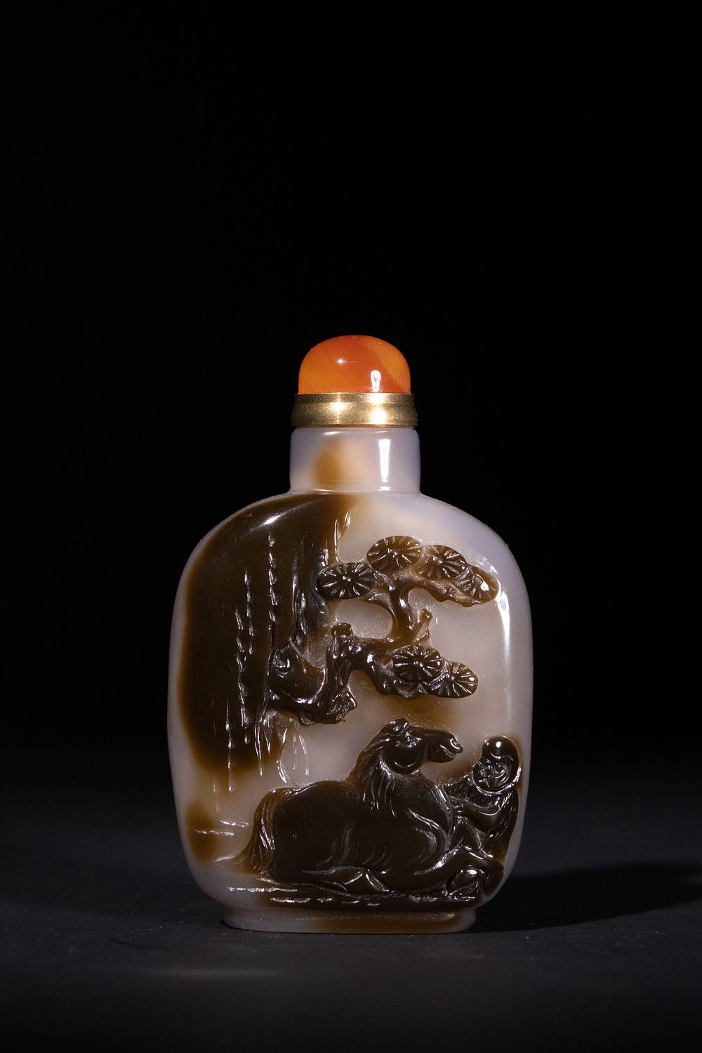 Lot 416: A Chinese Agate Snuff Bottle with Carved Landscape...
