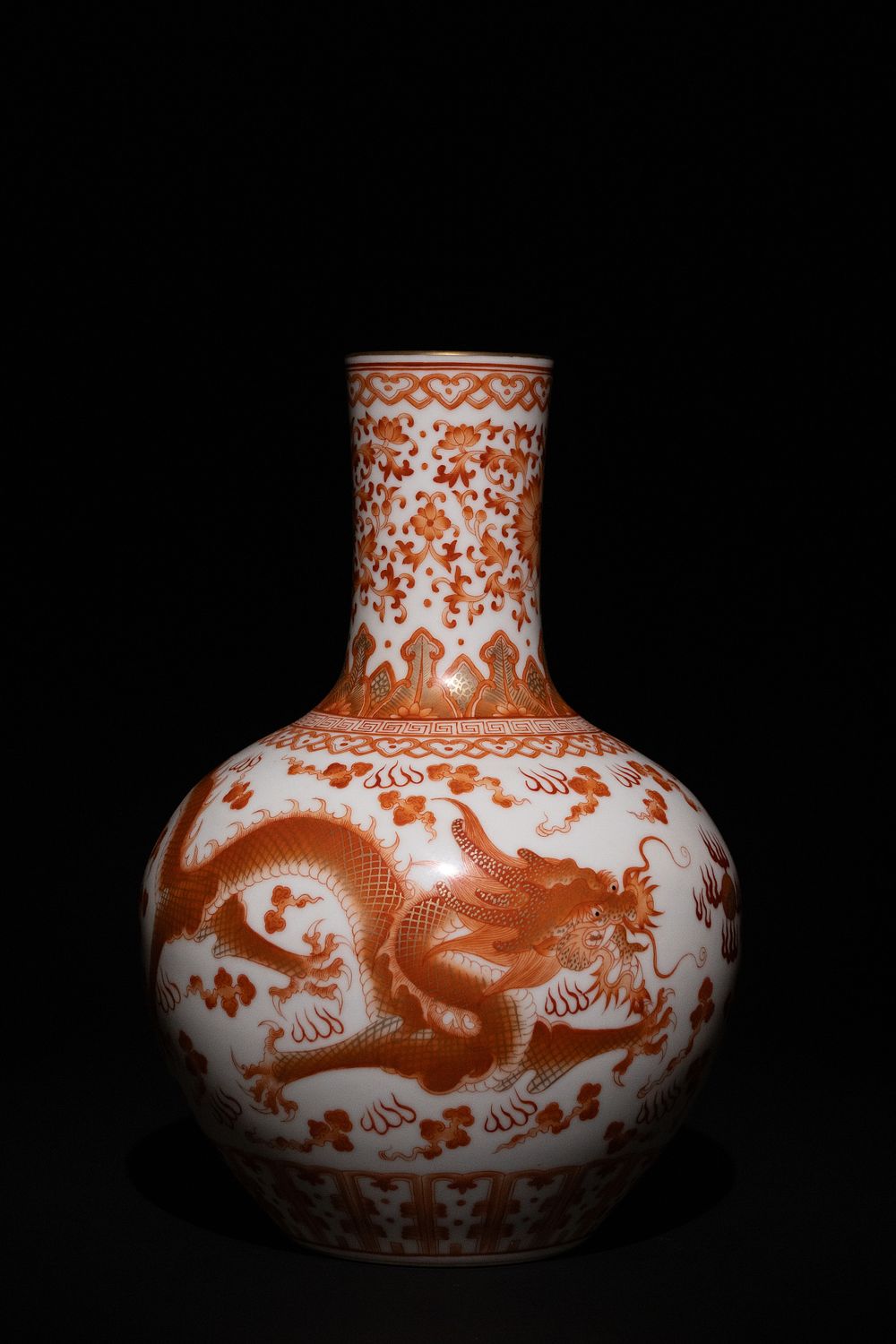 Lot 439: A Chinese Porcelain Vase with Iron-Red Dragon Motifs...