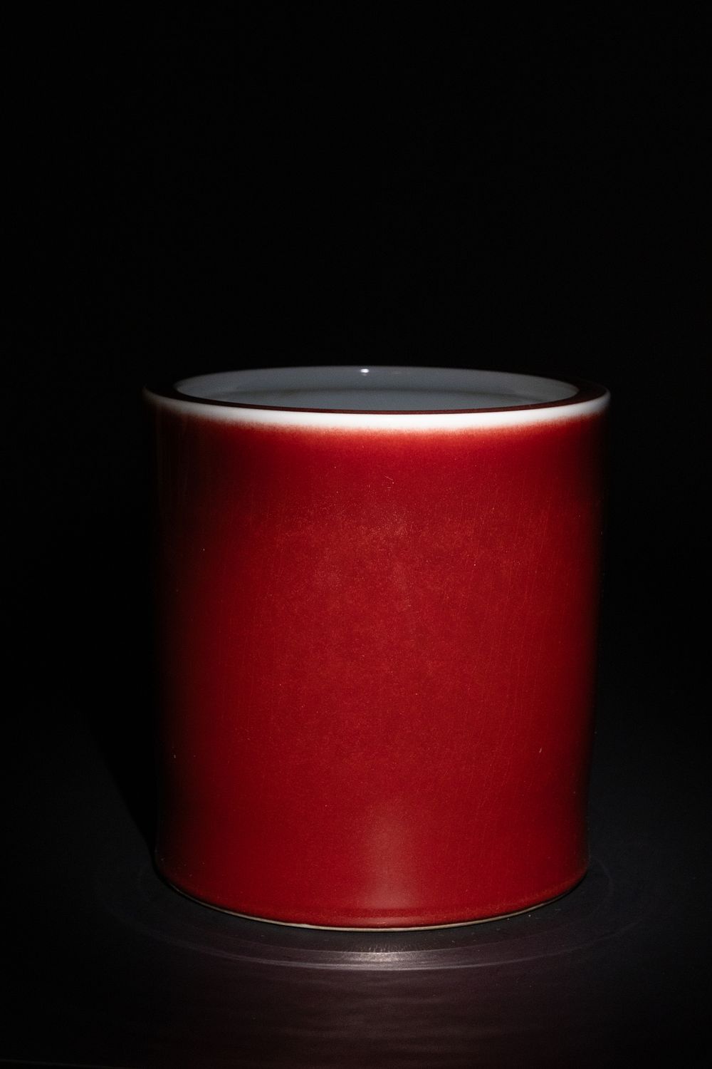 Lot 451: A Chinese Red-Glazed Porcelain Brush Pot with Six...
