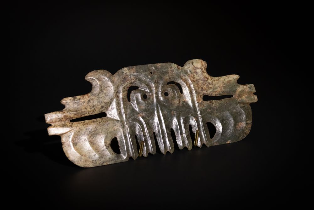 Lot 457: A Rare Chinese Jade Toothed Animal Mask Ornament,...