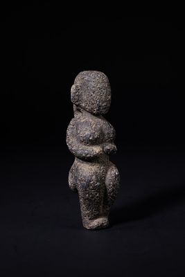 A Stone Anthropomorphic Fertility or Cultic Idol, Possibly Ancient. A vertically oriented 