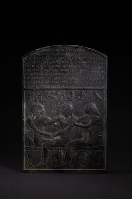 An Egyptian Carved Stone Relief Stele, Possibly Ancient. A carved stone relief stele of 