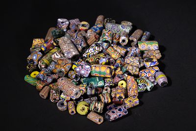 A Lot of Antique Millefiori Glass Beads. A vibrant collection of antique millefiori glass beads 
