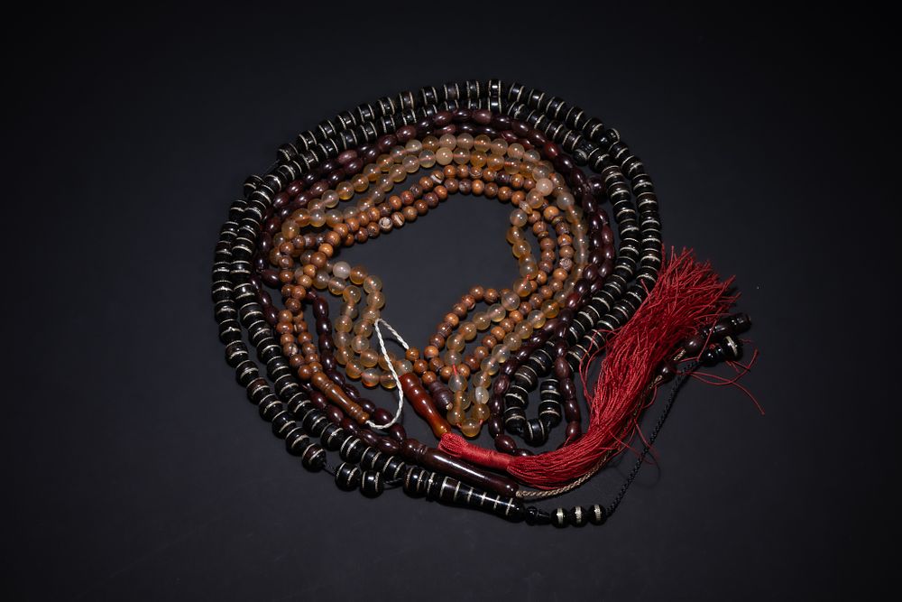 Lot 183: A Collection of Four Islamic Prayer Beads (Tasbih),...