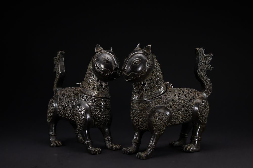 Lot 186: A Pair of Islamic Khorasan-Style Bronze Zoomorphic Censers.