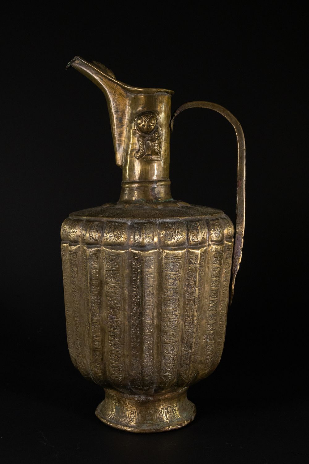 Lot 203: A Khorassan Bronze Ewer with Inscribed Panels, 12th...