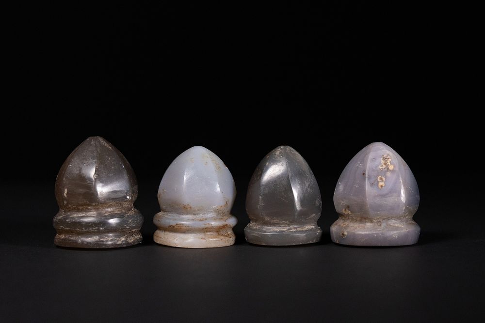 Lot 207: A Lot of Four Islamic Agate Gaming Pieces,...