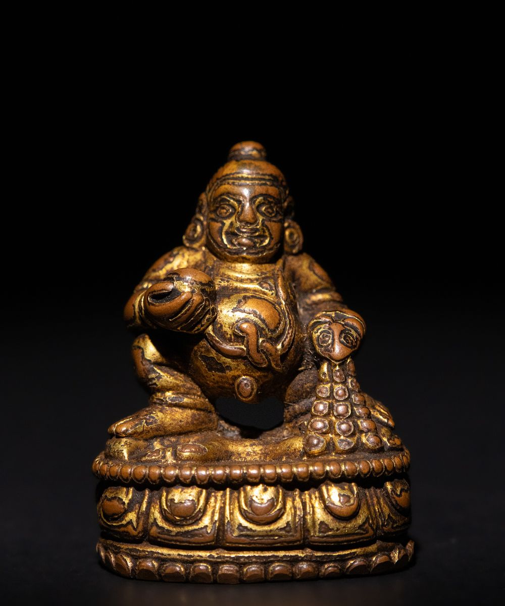 Lot 248: A Tibetan Gilded Bronze Statue of a Dharmapala,...
