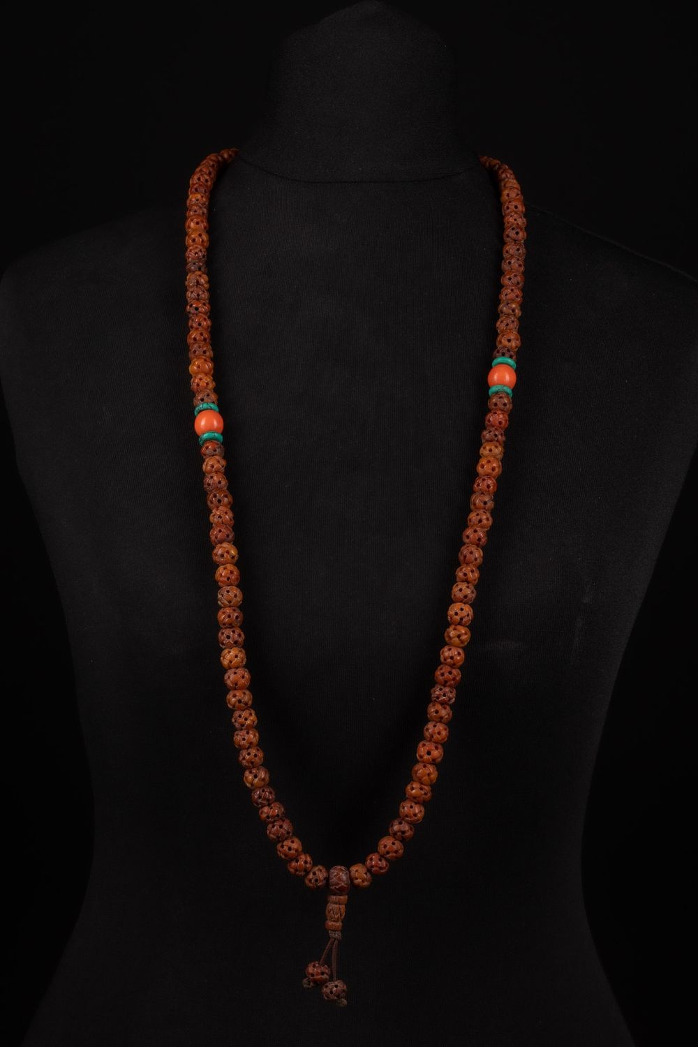 Lot 254: A Chinese Tibetan Carved Prayer Beads (Mala).