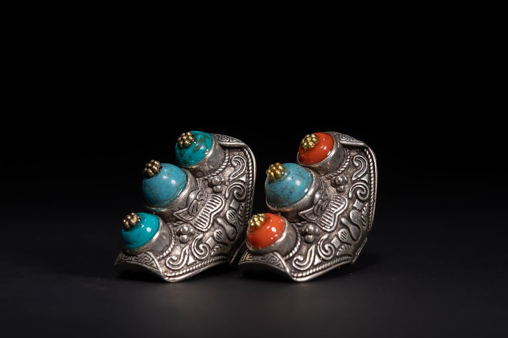 Lot 260: A Pair of Tibetan White Metal Rings Set...