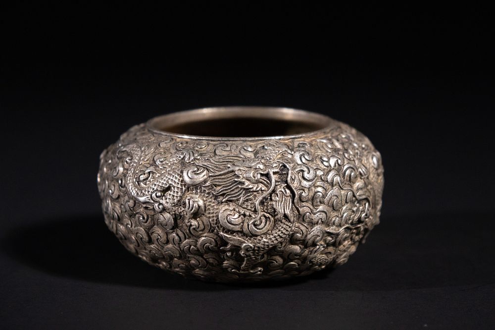 Lot 308: A Chinese White Metal Dragon Vessel, Qianlong Mark...