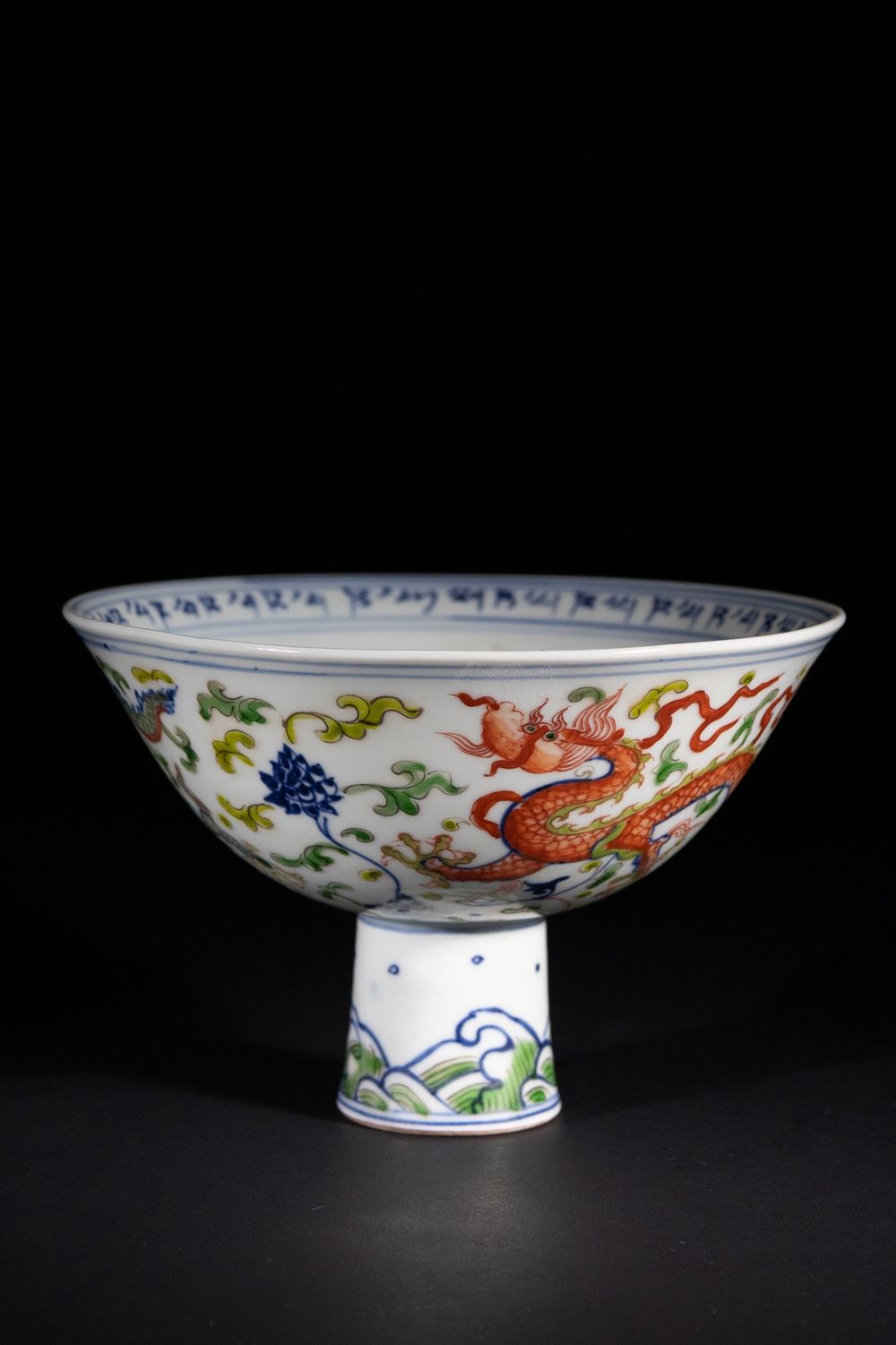 Lot 314: A Chinese Wucai 'Dragon' Stem Bowl, Xuande Mark...