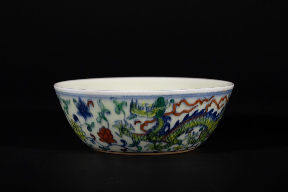 Lot 325: A Chinese Chenghua Doucai Dragon Pattern Bowl, Possibly...