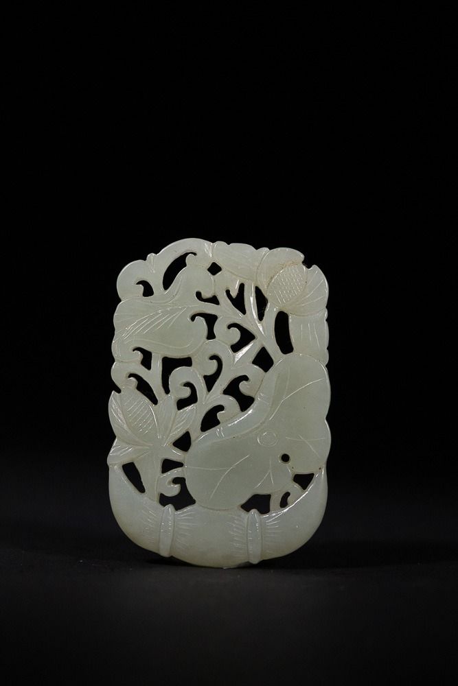 Lot 328: A Chinese Reticulated Hetian Jade Plaque or Pendant,...