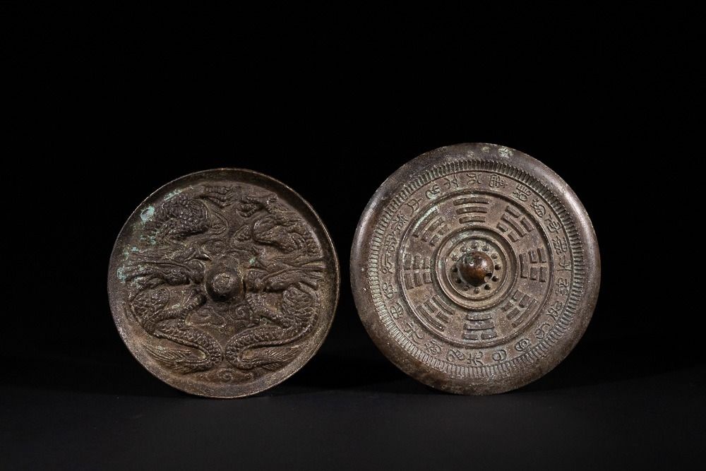 Lot 331: A Pair of Chinese Bronze Mirrors, one with...