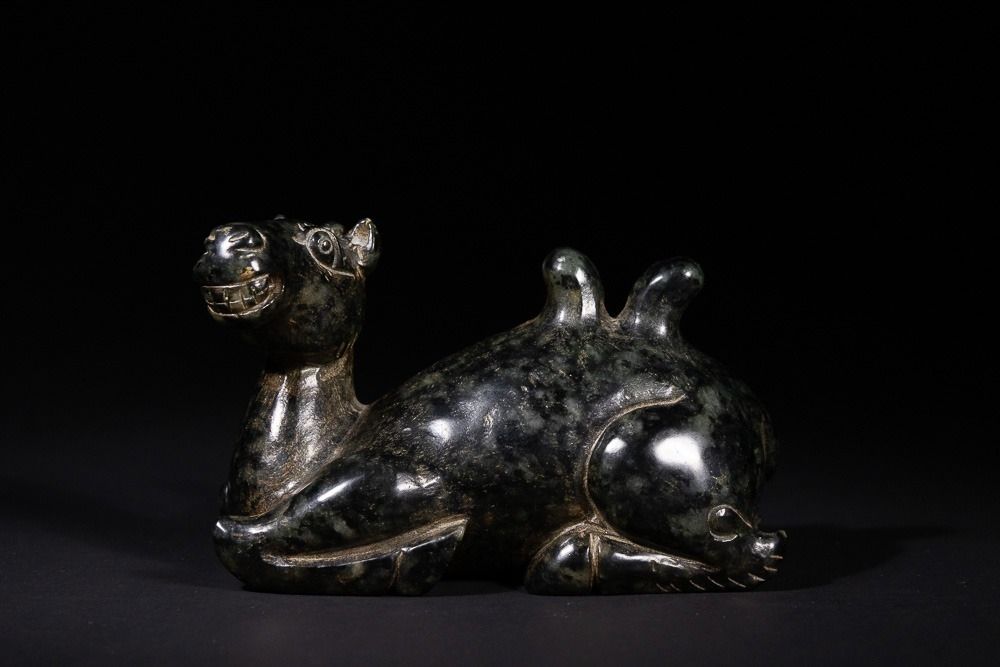 Lot 339: A Chinese Hetian Jade Recumbent Two-Humped Camel -...