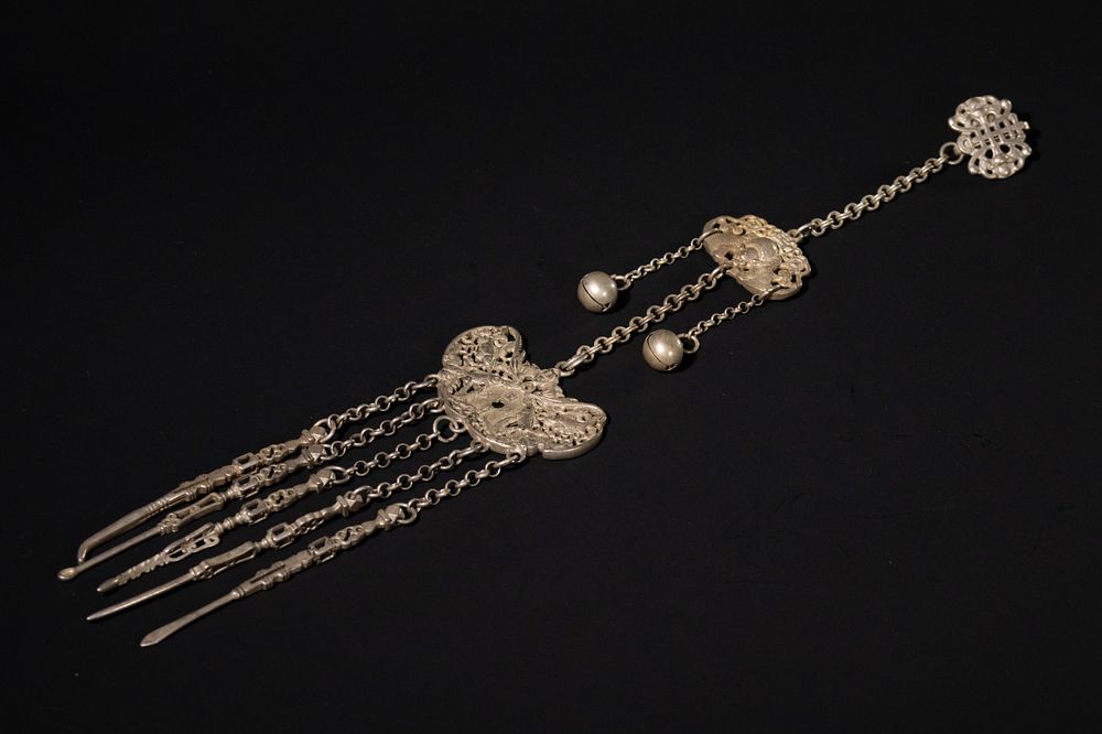 Lot 351: A Chinese White Metal Chatelaine with Grooming Tools,...