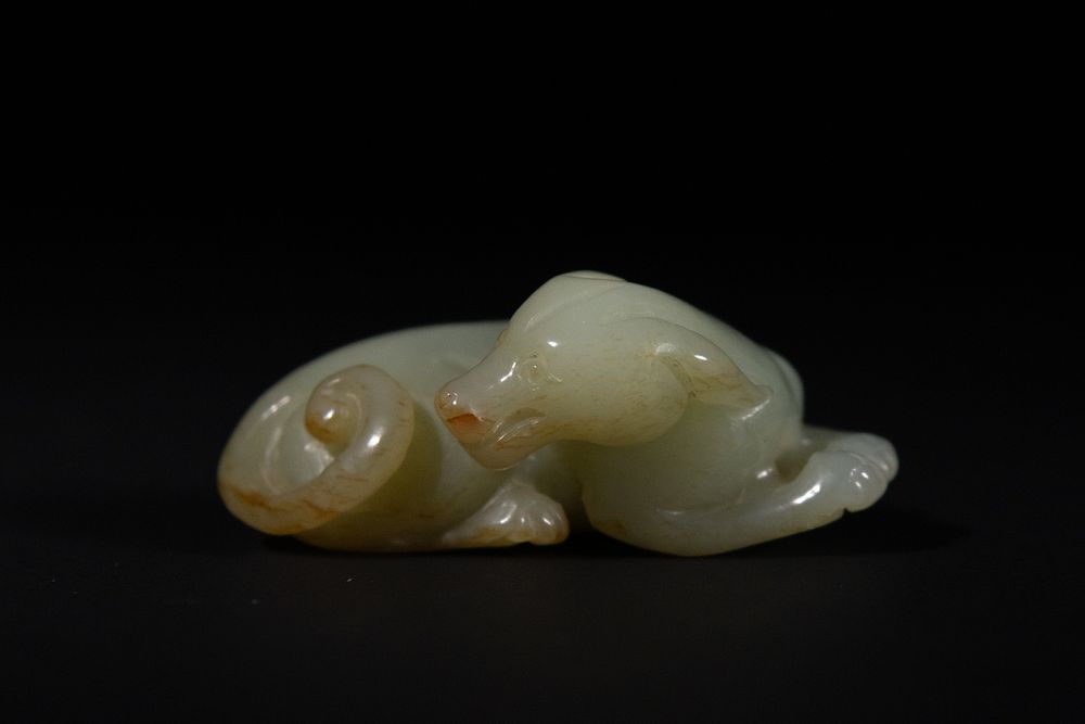 Lot 380: A Chinese Jade Carving of a Recumbent Mythical...