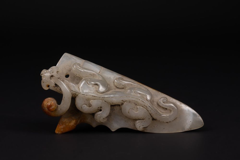 Lot 396: A Chinese Carved Jade Belt Hook with Dragon...