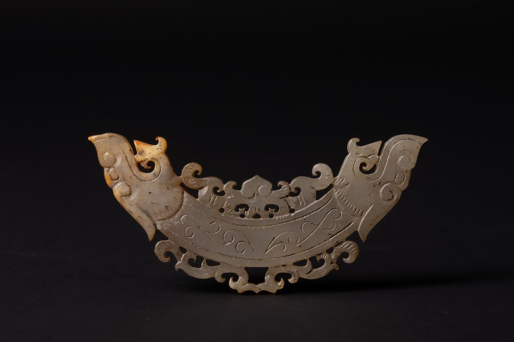 Lot 398: A Chinese Openwork Jade Plaque with Confronted Dragon-Head...