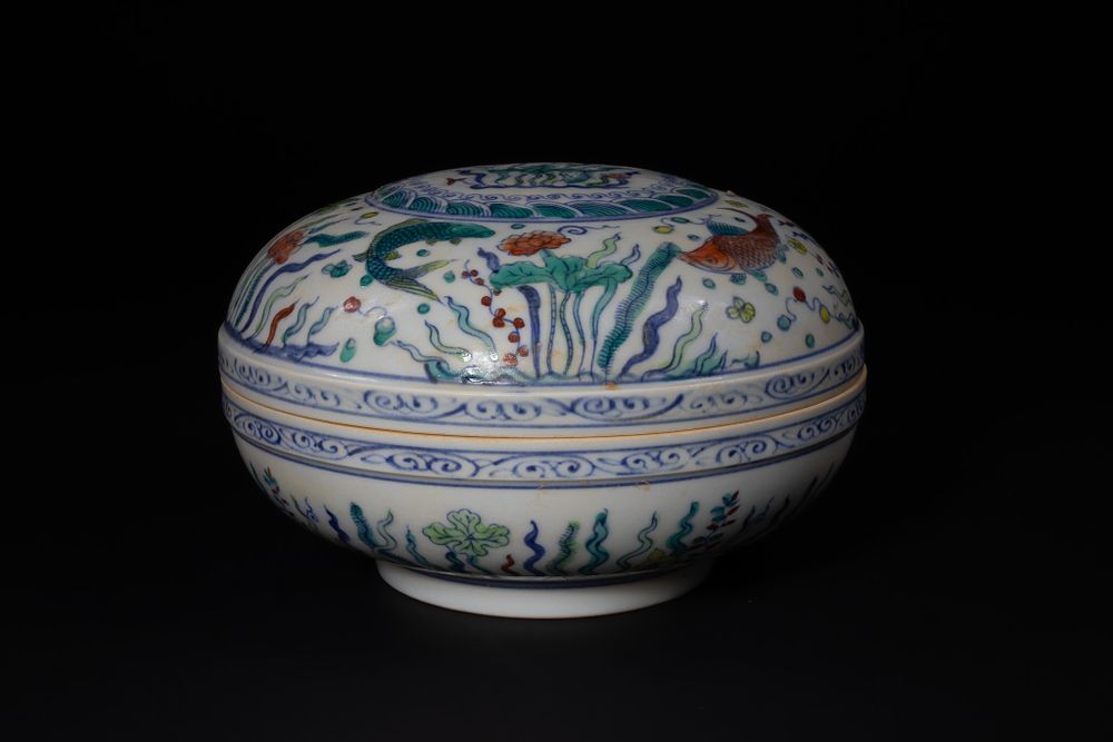 Lot 401: A Chinese Doucai-Style Porcelain Bowl with Fish and...