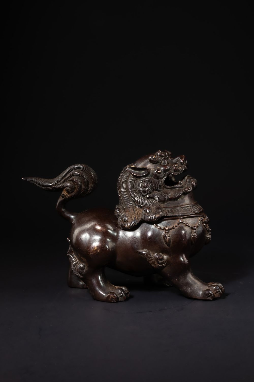 Lot 403: A Chinese Bronze Pixiu-Form Censer with Detachable Head.