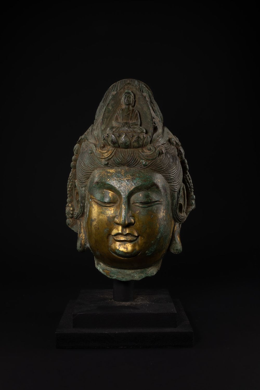 Lot 406: A Chinese Bronze Gilt Head of a Bodhisattva...