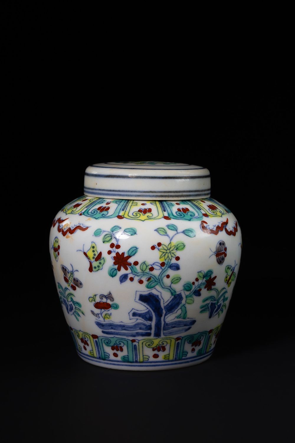 Lot 409: A Chinese Polychrome Porcelain Jar with Floral and...