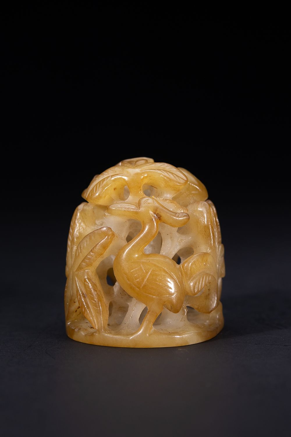 Lot 418: A Chinese Openwork Yellow Jade Carving with Bird...