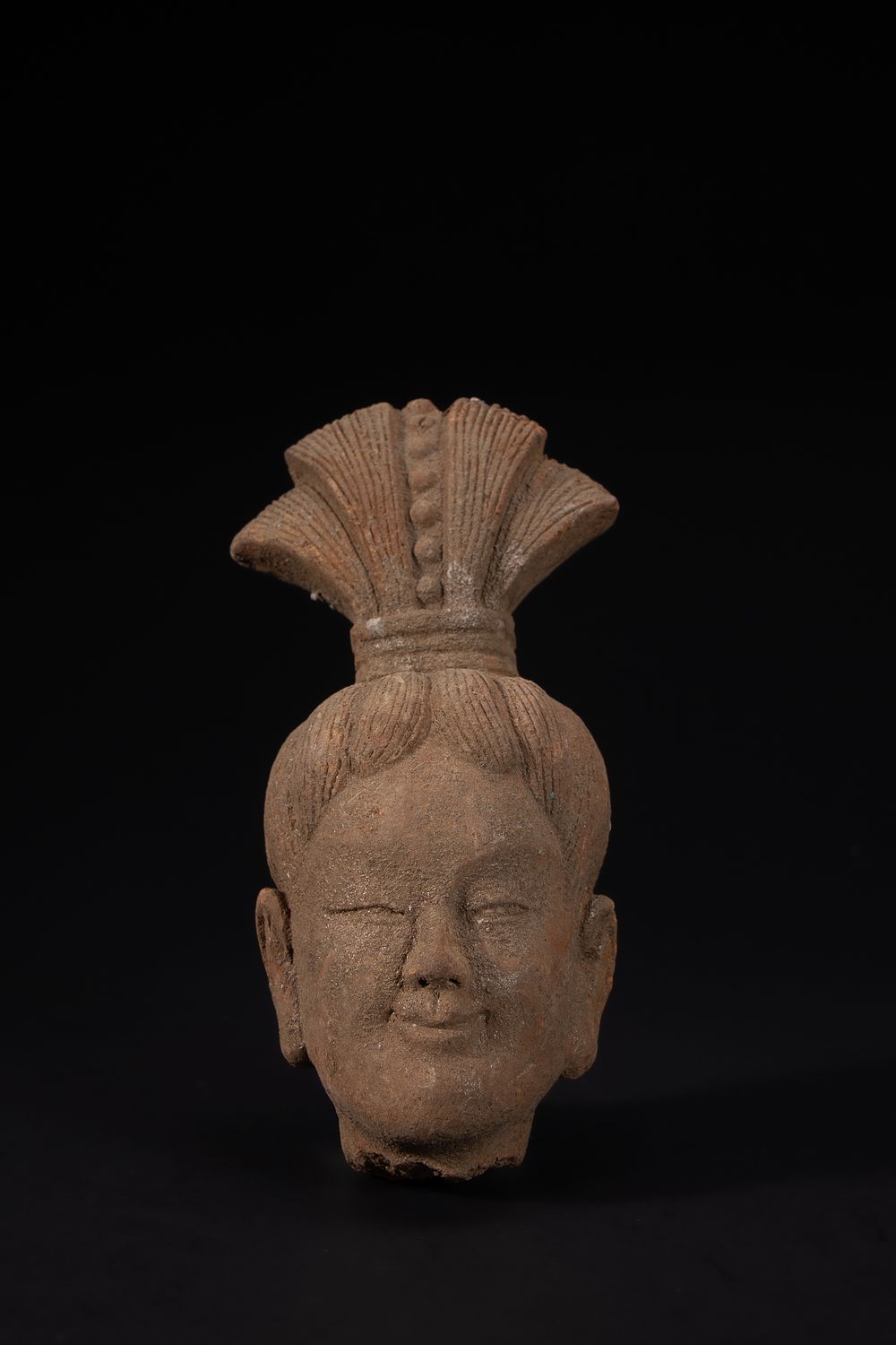 Lot 424: A Chinese Terracotta Head Fragment.