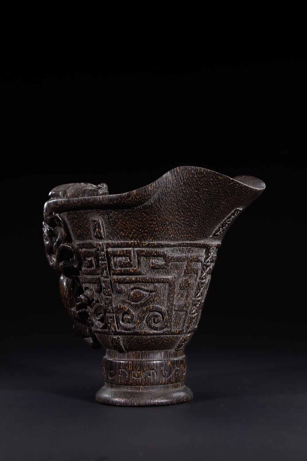 Lot 429: A Chinese Archaistic-Style Libation Cup with Dragon Handle...