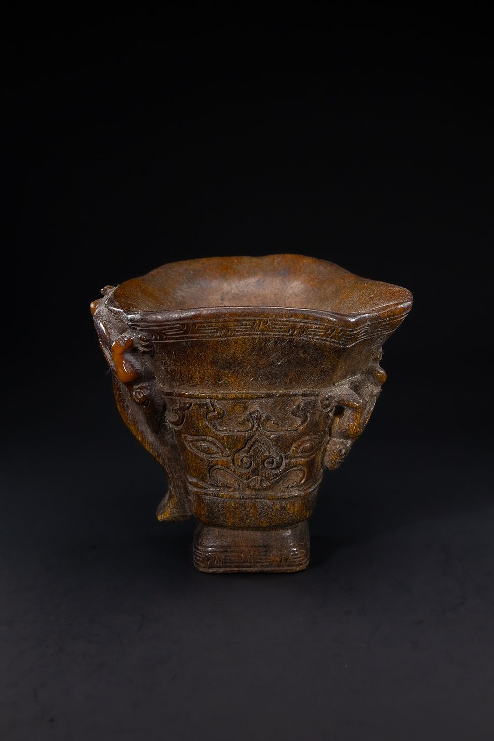 Lot 438: A Chinese Archaistic Style Carved Libation Cup.