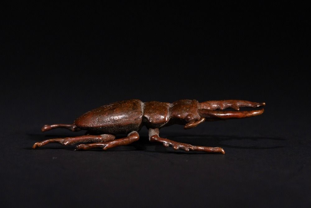 Lot 466: A Japanese Bronze Stag Beetle Okimono - A...
