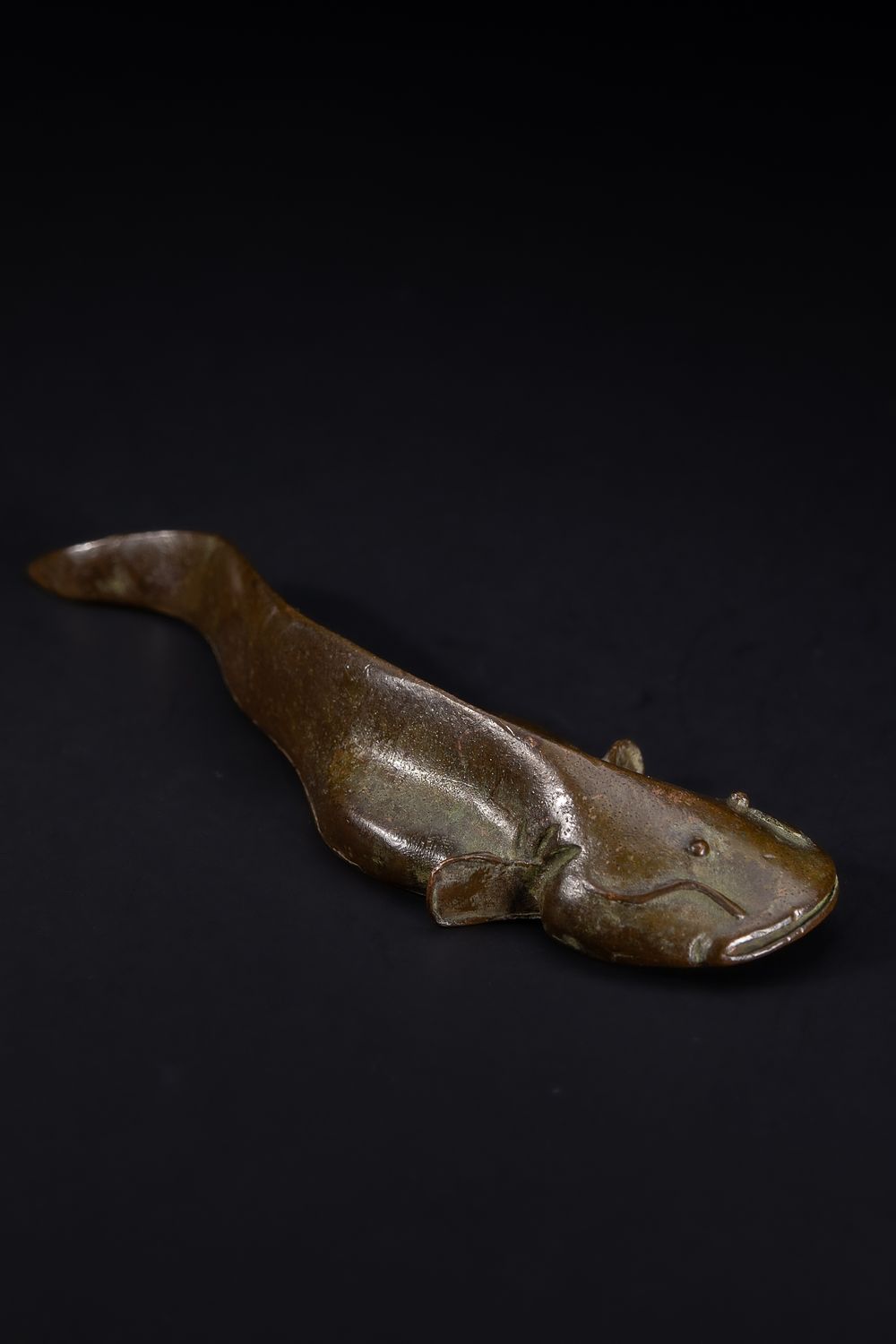 Lot 469: A Japanese Bronze Figure of a Fish.