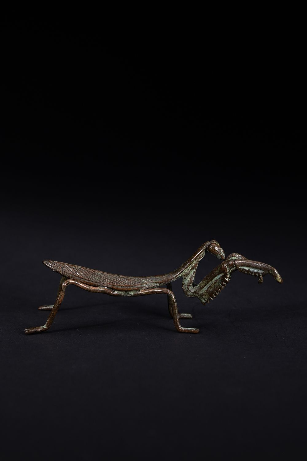 Lot 472: A Japanese Bronze Figure of a Praying Mantis.