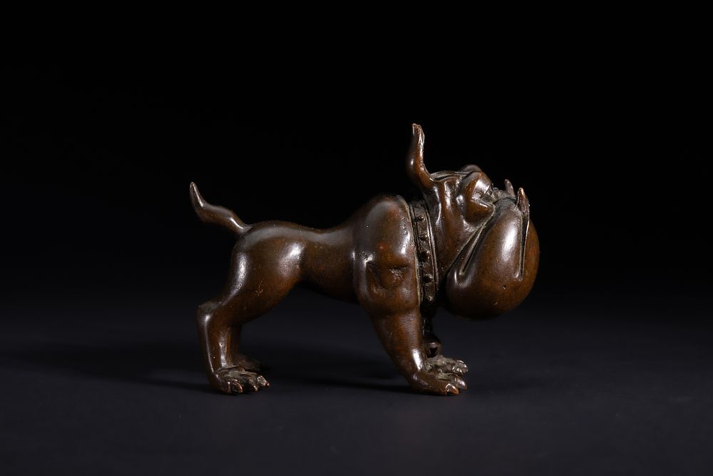 Lot 483: A Japanese Bronze Bulldog Figure with Collar and...