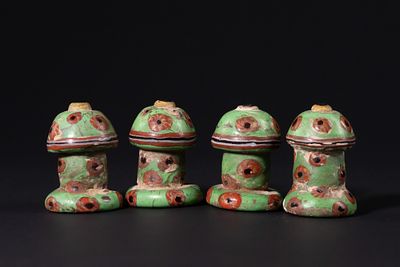 A Group of Four Polychrome Glass Gaming Pieces, Probably Syria, 13th Century or Later. A group 