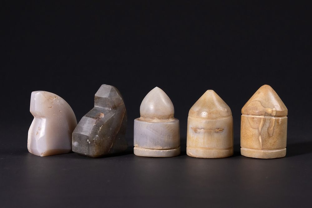 Lot 160: A Group of Five Islamic Agate Chess Pieces,...