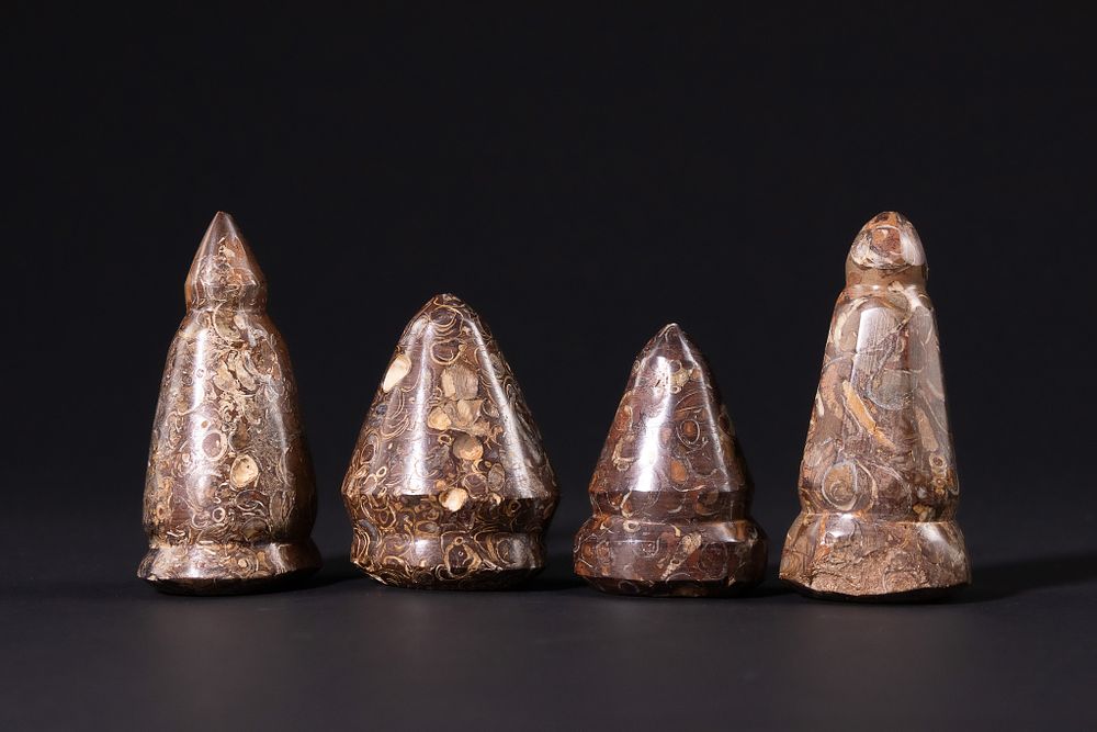 Lot 161: A Group of Four Islamic Stone Gaming Pieces,...