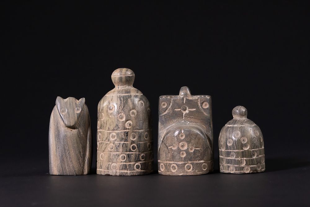 Lot 164: An Islamic Carved Stone Chess Set Comprising a...