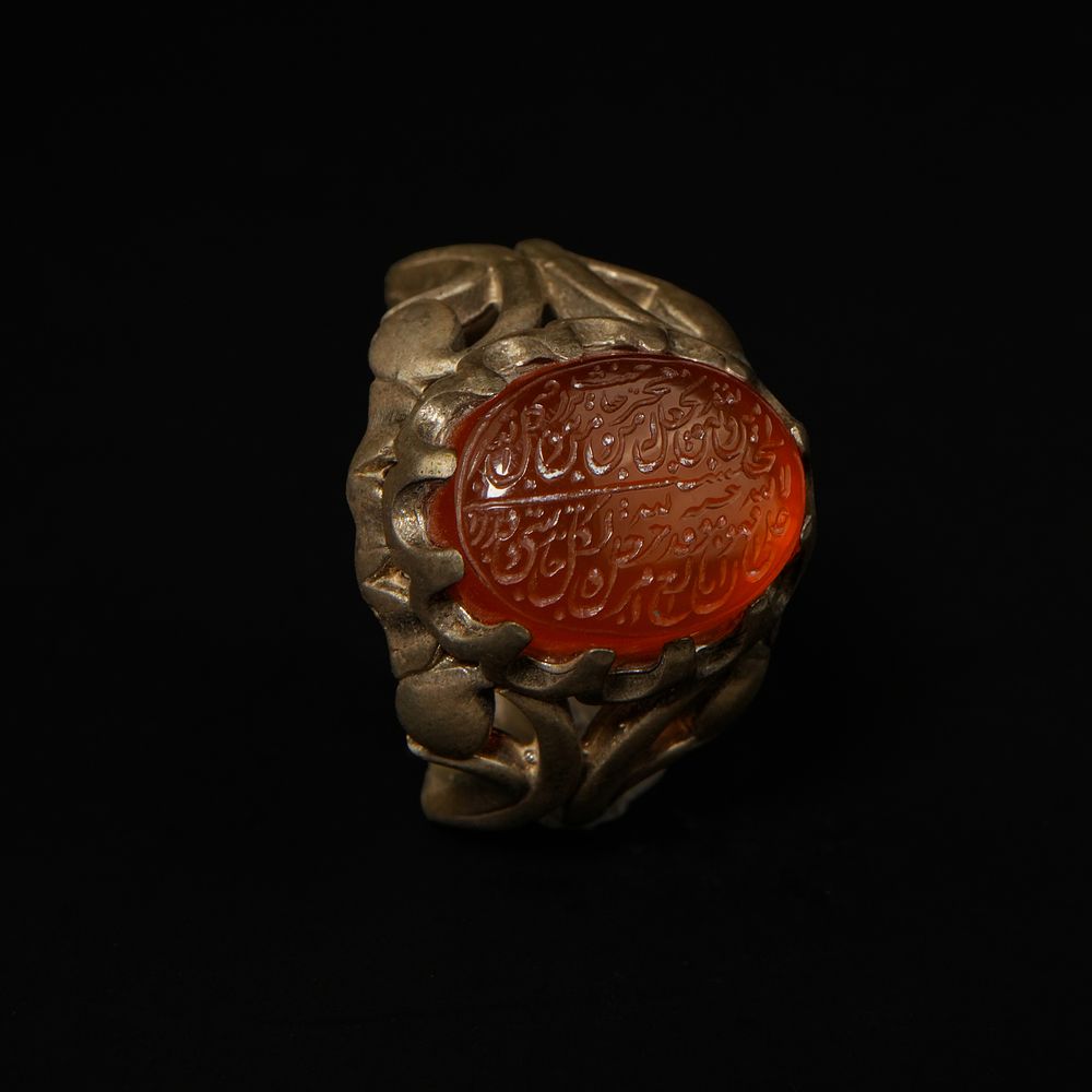 Lot 201: An Islamic Silver Carnelian Agate Calligraphic Seal Ring.